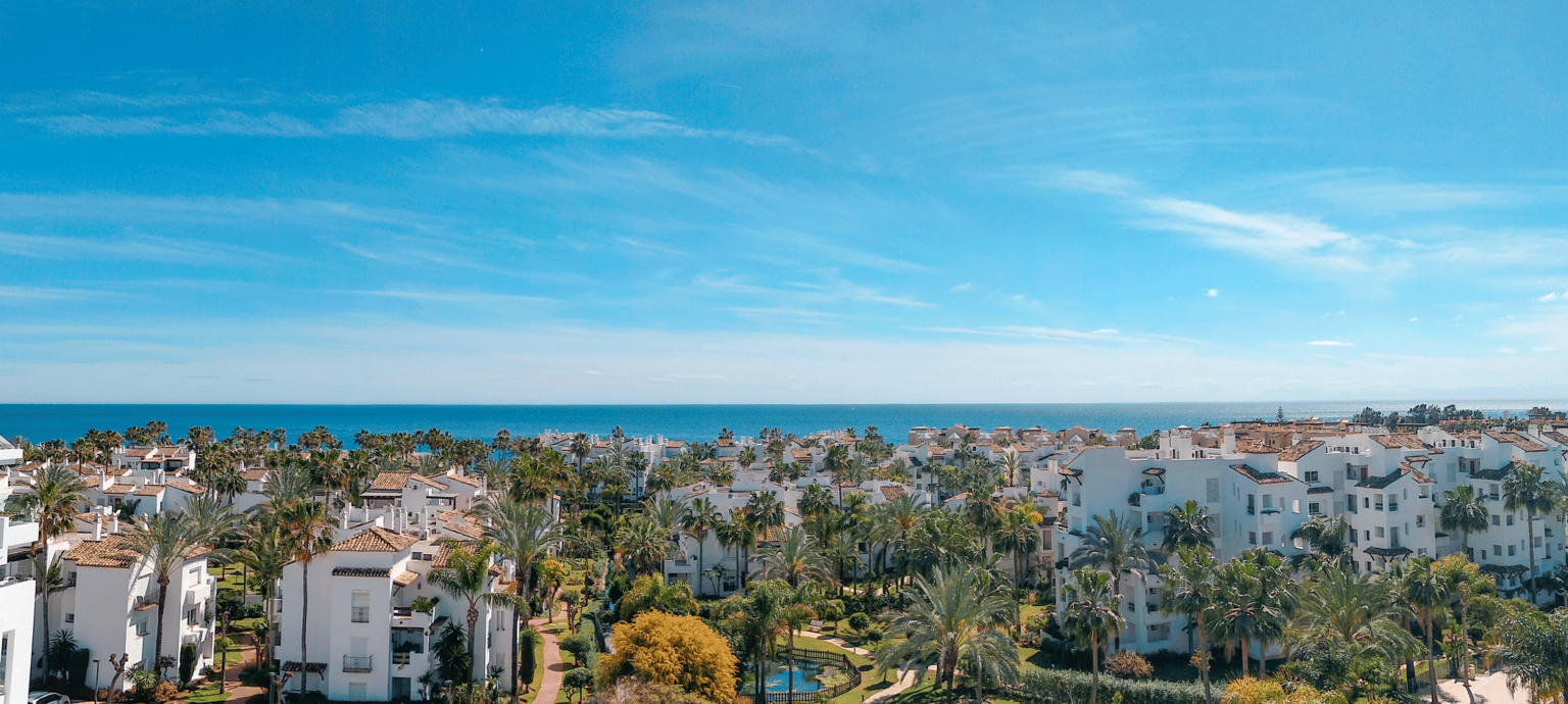 Costalita visión del palmeral generado con los jardines de las urbanizaciones